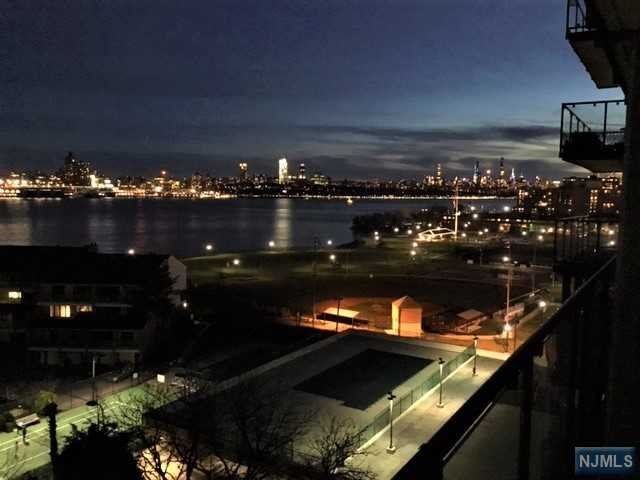 ALL UTILITIES / CABLE / INTERNET PACKAGE AND PARKING SPACE INCLUDED IN MONTHLY RENT - Move-in ready, spacious studio apartment boasting sweeping NYC and Hudson River views. Hudson Harbour Condos - 24hr doorman hi-rise tower in gated community with NJ bus to NYC at entrance, Featuring large, private balcony, pass-thru kitchen w/dishwasher, fully carpeted living/sleeping area, large closets, alcove dressing area and full bathroom. Building amenities include outdoor pool/tennis court and play/seating area, fitness room, laundry room. Adjacent to Veterans Park. Just minutes from GWB and Palisades Interstate Park with trails for hiking, cross-country skiing, cycling, boating access and riverfront picnic areas. Near shopping, fine dining, and Edgewater Ferry. Due at signing: 1st month's rent, 1-1/2 month security deposit, $750 refundable move-in fee and renter's insurance. A Must See!