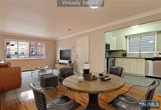 Located in best section of Union City known as West Hoboken. Completely renovated apartment with 3 Bedrooms and 1 Full Bath. Very large bedrooms and a huge living area make this something special. Kitchen has all new SS appliances including dishwasher. Bathroom renovated with new tub, toilet, tile and vanity. Tons of closet space throughout the apartment. Unit comes a shared back yard with BBQ to enjoy during the warmer months. 1 outdoor parking space included. Located right next to Washington Park, dog park, tennis courts, soccer field, grocery store, laundry mat and school. Steps away from major NYC transportation. Walk to Hoboken light rail from Palisades Ave. You won't find anything else like this!