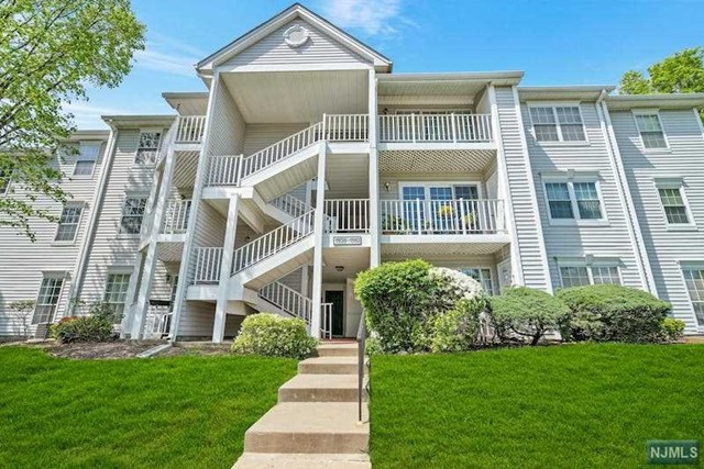 This lovely freshly painted & updated end unit home in desirable Darlington Ridge is ready for new owners. Located on the 2nd floor, this unit has a designated parking space on Boxwood Court so there are no stairs to climb! Ample guest parking is located on Sage Ct. A spacious primary bedroom w/bay window includes a large walk-in closet & updated full bath w/walk in shower. A 2nd renovated bath w/SOT is across the hall from a large 2nd bedroom w/2 closets. The updated kitchen w/granite countertops boasts a new GE refrigerator and dishwasher. Entertain in the formal dining room w/high hat lighting. Enjoy one floor living, doing your laundry in your own home & relaxing on your private deck through sliding glass doors off the spacious living room w/ceiling fan. Close to schools, shopping, transportation, pool, playground, tennis and dog area. This home has been lovingly cared for & is being sold as is w/no known issues. Don't miss out on this fabulous home in a great location!