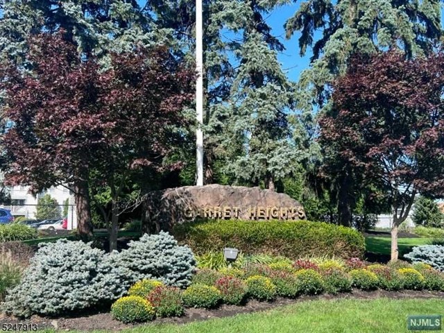 UPDATED 1ST FLR END UNIT IN GARRET HEIGHTS! WALK TO GARRET MOUNTAIN ACROSS THE STREET IS ACRES OF PROPERTY THAT IS YOURS TO WANDER & ENJOY. FEATURES 1 FLR LIV/W 2 GD SIZE BDRMS, 2 UPDATED BTHS, KITW/BREAKFAST BAR, NEW APPLIANCES & PLENTY OF COUNTER SPACE. FORM DR W/FRENCH DRS TO PATIO. LARGE LR W/FP. LRG PRIMARY BDRM OFFERS 2 DOUBLE CLOSETS & NEW BATH W/ WALK-IN SHOWER & LRG VANITY. 2ND BDRM CURRENTLY SHARED AS A HOME OFFICE IS ANOTHER GD SIZED RM & FEATURES WALK-IN CLST. NEWER HVAC & WATER HEATER APPROX. 4 YRS OLD, HOME WAS RECENTLY UPDATED HAS SEPARATE LAUNDRY RM INSIDE THE HOME. CONVENIENTLY LOCATED BY RT 80, PUBLIC TRANS & CLOSE TO MAJOR SHOPPING. ENJOY WALKING & HIKING TRAILS, FISHING, GORGEOUS VIEWS AND AN EQUESTRIAN CENTER ALL WITHIN WALKING DISTANCE.