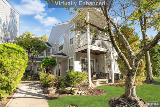 Welcome to this meticulously maintained 1+ bedroom 1 full bathroom ground floor end unit in the sought after Paddington Square community. Newer kitchen with breakfast bar, granite counter tops and stainless appliances. Open concept living room/dining area with gas fire place and sliders to a patio. Nice-sized primary bedroom with a walk-in closet. Wood floors on the first level. Beautifully finished lower level recreation room with an additional guest room/office space with 2 closets. Pet friendly complex with private pool and clubhouse. Close to highways, NYC transportation and shopping. One assigned parking space and ample guest parking. Just unpack and move in!
