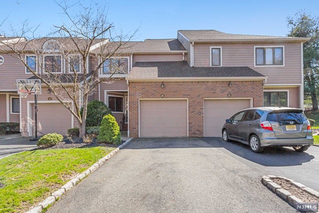 Discover modern living at its finest in this meticulously maintained townhouse in the sought-after Brandywyne complex. Recent upgrades include a newer roof, gutters, and freshly painted siding, and this home exudes charm and durability.The main level welcomes you with a thoughtfully designed layout, seamlessly connecting the kitchen, dining room, and inviting family room with fireplace. From the adjacent living room, step out onto the tranquil deck, perfect for enjoying morning coffee or evening stargazing.Upstairs, find sanctuary in the spacious master bedroom, which has a generously sized walk-in closet and en-suite bath. A second bedroom, with its own walk-in closet and hall bath, adds convenience. A dedicated laundry area adds convenience.The allure continues with a fully finished basement offering endless possibilities for recreation or a home office. Located in a prime spot near highways, this residence ensures effortless commuting and access to amenities.