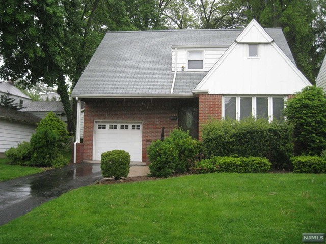 Now Available! Lovely Side Hall Colonial in prime location. Spacious Newly Painted living room with large window and formal dining room with gleaming hardwood floors. Eat-in-kitchen with stainless steel sink, powder room and 3 season enclosed sunroom. C/AC and gas heat. 2nd floor: 3 large bedrooms with full bath and separate shower. Finished basement with full bathroom, laundry, refrigerator, storage closets and office. Nice sized backyard and automatic attached garage. Near several houses of worship, NYC buses, parks, shops and access to major highways. Tenant is responsible for landscaping, snow and garbage removal. NO PETS OF ANY KIND>