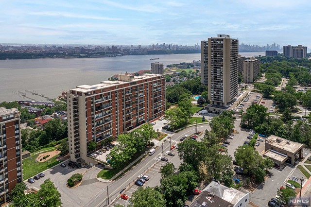 ***CALL/TEXT ERIC @ 201-421-5949 to schedule a showing***Welcome to Horizon House, building 3 residence 816. Discover this bright & charming 1 bedroom with stunning sunset views. This unit features hardwood flooring throughout, beautiful cherry wood cabinetry with granite counters, stainless steel appliances & ample closet space. Full service luxury amenities include a 24-hr doorman, community room, gym, laundry, outdoor swimming pool, tennis courts, and public transportation just steps from the complex. Maintenance TOTAL including Garage Parking ($108), Cable ($48.90), Assessment ($163.33), and Base ($1,286.01) is $1,606.24. Maintenance includes property taxes and all utilities! Pool/Gym/Tennis are additional fees. An all cash purchase requires a minimum income of $77,100/year. Subject to board approval: Min 25% down, 4-to-1 Income-to-Debt Ratio.