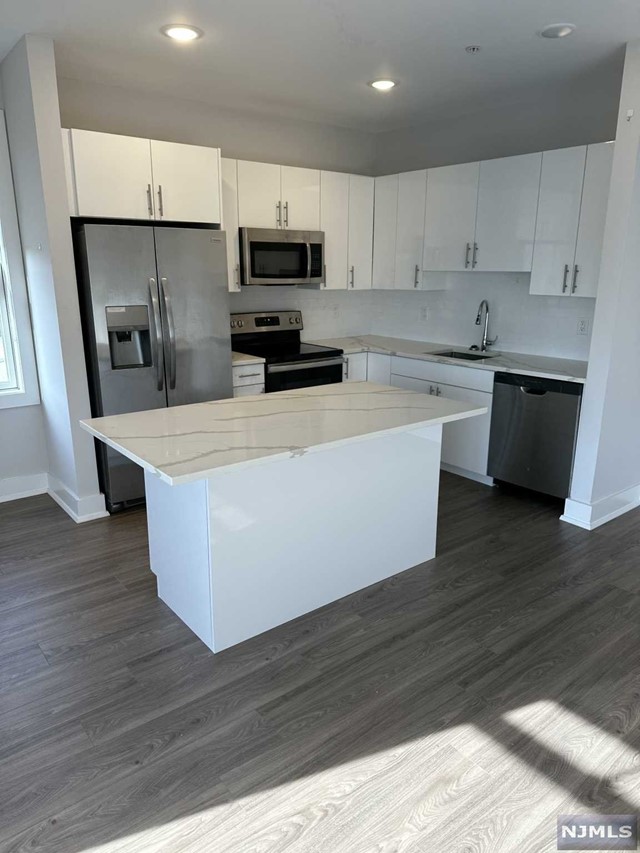 1 parking space INCLUDED, and REDUCED security to qualified applicants - Welcome to The Addison - Fort Lee's new luxury rental building offering a variety of upscale, spacious floorplans. The Addison offers high-end residences fully equipped w/ modern kitchens w/ stainless steel appliances, quartz countertops, full islands & tiled backsplashes, open living/dining areas, shades on all windows, modern bathrooms & a full-sized washer & dryer in each unit. Exclusive 24/7 virtual doorman service for communications, package deliveries & access control via video intercom system linked to your smart phone. The Addison includes a large on-site fitness center including virtual touchscreen workout mirror, electric car charging stations & parking garage w/ direct elevator access to all residences for uncompromising security. Pet friendly ! (LB limit & fees apply) Tenants pay utilities. All amenities & one garage parking space is included.