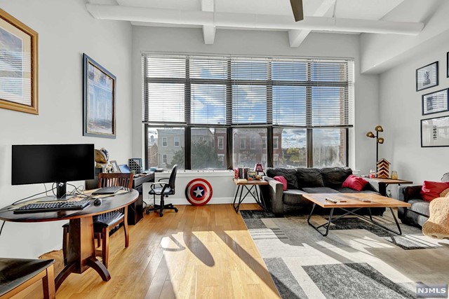 Foundry Lofts at Liberty State Park: One Bedroom Loft Condo at the Foundry at Liberty State Park. Very bright & airy South facing unit. 14' ceilings throughout. Low monthly condo fee, low property taxes (abatement thru 2025). Located on 2nd floor in elevator bldg. The Foundry Lofts feature a 24-hour front desk with package room, gym, common outdoor area. Purchase price includes an assigned outdoor car parking space.