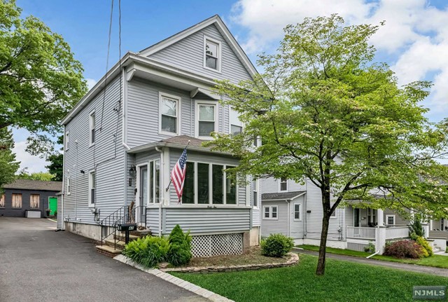 Discover modern comfort and convenience in this stunning first-floor rental located in a charming two-family home. This inviting space flows seamlessly into a cozy living room, offering a relaxing retreat. The highlight of the home, a chef's eat-in kitchen, complete w/stainless appliances along w/peninsula seating. Enjoy the privacy of 2 bedrooms and a well-appointed bathroom. The unit also features an enclosed porch, perfect for office/rec room, and a basement equipped w/laundry area & ample storage. Outside is parking for 2 cars. Situated just 1 block from shopping & public transportation with easy access to all. Downtown Ridgewood, just a mile away with its shops & restaurants. Both units enjoy a beautiful shared backyard, and benefit from worry-free maintenance with the landlord handling snow removal and landscaping. Tenant responsible for utilities. No pets and no smoking policy ensures a serene and pristine environment. Owner holds NJ RE Lic.