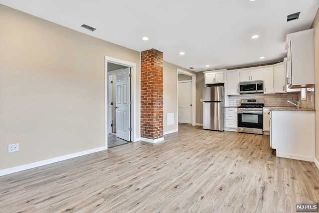 This stunning, fully renovated second floor unit is centrally located in downtown Butler, just minutes from Rts 23 and 287. This spacious apartment boasts a new kitchen with granite countertops, stainless steel appliances and new windows, as well as central air, in unit laundry and private parking. It also features beautiful exposed brick chimneys and an oversized master bedroom with a walk-in closet and plenty of storage space throughout. Carefully renovated and beautifully maintained, this sunny unit is the perfect opportunity to be located close to shopping, transportation, restaurants, and parks!