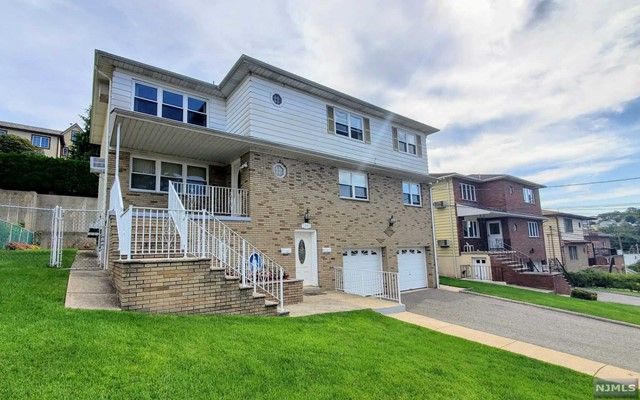 *** See 3D Virtual Tour *** Large 3 bedroom & 2 full bath apt on 2nd floor of over-sized 2-Family home. with a separate entrance. Very clean house and it faces South with many windows to bring in a lot of natural sunlight. Very spacious bed rooms, living room and formal dining room that is clean and well maintenanced house. Front and back yards are professionally landscaped (Landlord pays for lawn care). Located in a very convenient section of Palisades Park, close to schools, shops, and great restaurants on Broad Ave as well as easy walking distance to NYC buses. Laundry in the basement. 1 parking space on the driveway (Tenants remove snow their parking spaces). Pets not permitted.