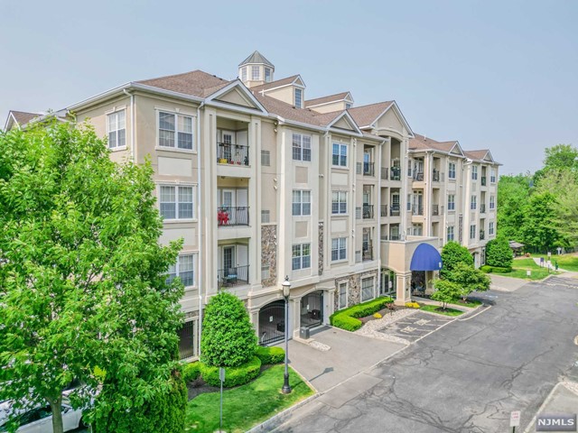Welcome to this largest penthouse model offering comfort and elegance w exceptional features. Convenient elevator access to your private flr. Upgraded large EIK is a chef's dream come true having a spacious island, brkfst bar, granite countertops, and SS appls. Sizeable DR w vaulted ceilings is the perfect setting for hosting gatherings. Bright LRm w a cozy gas fpl, provides a warm and inviting atmosphere. MstrBdrm suite w WIC, extended sitting area w access to a second terrace and Mstr Bath. 2nd full-size bdrm, upgraded FBth and Lndry complete 1st flr. 2nd level offers Fam rm & Lg multi-purpose rm. Upgrades include decorative crown molding throughout, recessed lighting, and gleaming laminate wd flrs. Assigned storage unit on same level and covered parking for 2 vehicles. Clubhouse offers outdoor pool, gym, game rm & bar/lounge. Pet-friendly. Conveniently located to public trans, major highways, and a variety of shops. A Must-see!