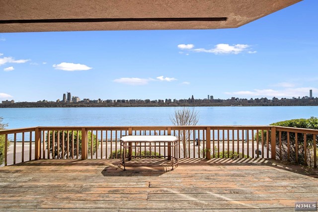 TOM MCCARTHY (201-206-8144) & The Chen Agency present: Come experience living at Independence Harbor, the most incredible waterfront location! This 1496-sf split-bedroom floorplan has completely unobstructed Hudson River views from every window. You can see from the GW Bridge all the way down to New York Harbor with Manhattan in between. Amazing waterfront deck, eat-in kitchen, and private laundry room. Large custom closet. Gas heat & central air. 2 garage parking spaces. Community has a 24-hour gatehouse, outdoor pool, tennis & basketball, clubhouse with gym, and direct access to the Hudson Riverfront Walkway. Transportation to New York City is right out front. For all showings please contact TOM MCCARTHY at 201-206-8144 or Tom McCarthy201@gmail.com