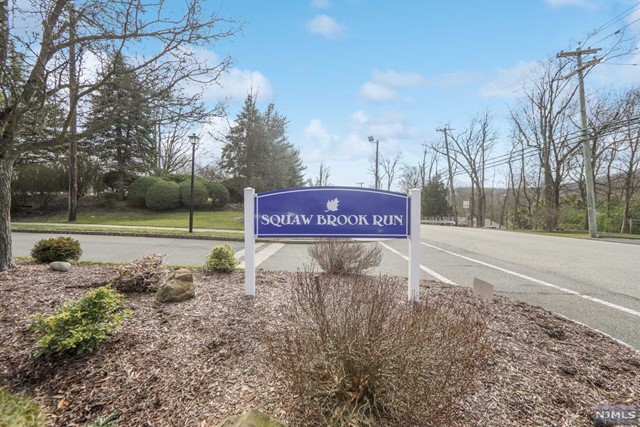 Fantastic opportunity in Squaw Brook Run!!!! If you are looking for one of the best locations in this complex, then your search has ended! Set in the rear of the complex, surrounded by woods and private homes, this beautiful end unit has tons of natural lighting and the large deck is private and overlooks the woods. Enter to an open floor plan with a 2 story living room w/ fireplace; Formal Dining Room overlooks the family room & opens to the Kitchen; complete w/ granite counters, peninsula to dine at & separate dining space. 2nd Floor finds two spacious bedrooms, updated full bath & laundry room...continue to the gorgeous Primary Suite with vaulted ceilings, luxurious bath with soaking tub & stall shower; plenty of closets. The walk out basement makes for a great recreation space (gym, office, bar), tons of storage, bathroom & more! Attached 2 car garage and long driveway are an added bonus. Come discover what living in this desirable Squaw Brook Run community has to offer!