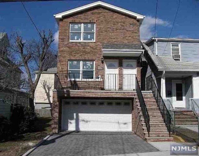 Brand new apartment with 4 Bedroom and 3 Bathroom with Balcony. Upstairs consist of kitchen and living room, as well as 3 bedrooms and 2 bathrooms. Ground level has 1 bed room, summer kitchen, 1 full bath laundry, 1 parking space and 1 garage parking, and a nice backyard: nearby parks and close transportation to NY. Ready to move in! Contact the listing agent today for easy showings.