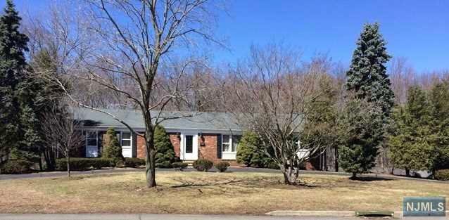 This rental house is ready to become a home. It's perfectly situated at the end of the street. With 3 (4) great size bedrooms , large living room, dining room, family room with an extra large room for office space and Possible bedroom an kitchen that walks out to a great size deck. This home also has new central air conditioning two car attached garage circular driveway and a Wonderful size yard.