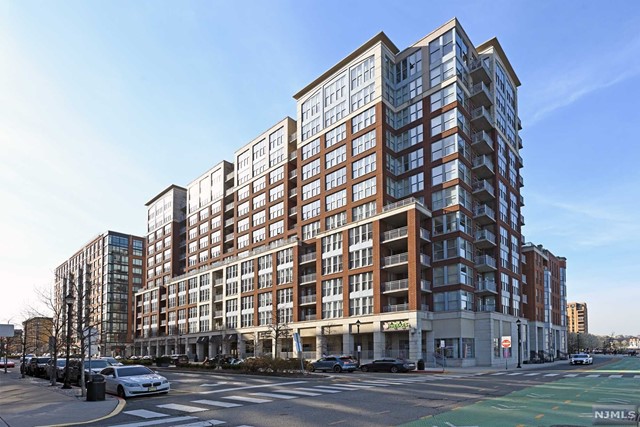 Welcome home to this one of a kind North-East facing 2bd+den/2.5ba/1915sqft corner unit with direct skyline views from each room in addition to your private balcony. The large open concept living area is perfect for entertaining with a Chef's kitchen overlooking the living room & formal dining room, a working fireplace, and custom window treatments. Open style chef's kitchen features granite counters, breakfast bar, ss appliances and custom cabinets & back splash. The two large bedrooms each come with their own spa like ensuites and custom closets. The den can be used as an office or nursery. The luxury Maxwell Place community offers 24/7 concierge service, gyms, 2 outdoor pools, jacuzzi, theater room, yoga room, newly renovated community rooms, shops on premises and shuttle service to and from the PATH. Conveniently located near NYC water Ferry, bus stop, and all that uptown Hoboken has to offer.