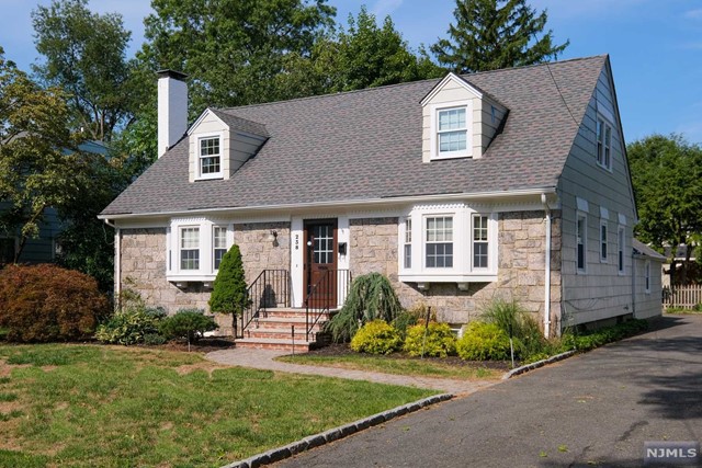 Expanded cape on quiet cul-de-sac. Larger than it looks! Family room addition featuring French doors to brick patio. Living room with fireplace and bay window, full dining room, kitchen overlooking family room with 2nd fireplace. Two bedrooms on main level and two upstairs. Both upstairs bedrooms have charming dormered windows. At the top of the stairs is sitting area suitable for office or homework nook. Each level has a full bath. Large basement with vinyl plank flooring. Central A/C. Occupancy date 10/1.