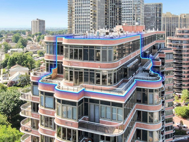 LUXURY 3 BEDROOM PENTHOUSE DUPLEX WITH LARGE WRAP AROUND TERRACE, VIEWS FROM THE GWB DOWN TO THE STATUE OF LIBERTY. LARGE WINDOWS THROUGHOUT THIS DUPLEX GIVE YOU NATURAL LIGHT THROUGHOUT AND INCREDIBLE VIEWS DAY & NIGHT. FIRST FLOOR FEATURES LARGE LIVING ROOM WITH WOOD BURNING FIRE PLACE AND BAR FOR ENTERTAINING. POWDER ROOM DIRECTLY OFF OF LIVING ROOM. FIRST FLOOR BEDROOM FEATURES FULL BATH AND BUILT IN CLOSET. KITCHEN AND DINING ROOM ON FIRST FLOOR AS WELL. ELEVATOR TAKES YOU TO THE SECOND FLOOR WHERE YOU WIL FIND THE MASTER BEDROOM SUITE W/ SITTING ROOM AND WOOD BURNING FIRE PLACE. WIC W/ OAK BUILT INS AND A SEPARATE GRAND DRESSING ROOM WITH VANITY SINK AND BUILT INS. MASTER BATH WITH DUAL SINKS, WHIRLPOOL AND SEPERATE RM FOR TOILET & BIDET. 2ND BR ON 2ND FLOOR FEATURES PRIVATE BATH AND WIC. SERVICE ENTRANCE THROUGH LAUNDRY ROOM ON 1ST FLR. BEAUTIFUL BUILDING WITH ENDLESS AMENITIES AND AN EASY COMMUTE TO NYC.