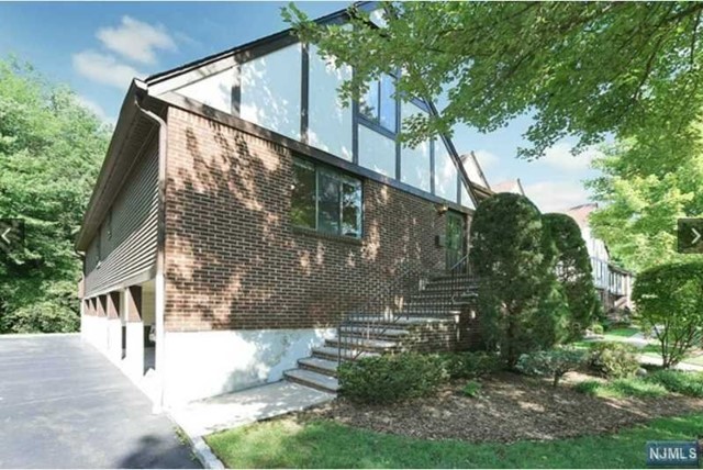 Beautiful renovated end unit. One of a kind, spacious 2 story Holiday Farms townhome available for quick occupancy. A must-see beautiful home! 4 bedrooms; 2 newer full baths. Modern kitchen w/granite counter-tops, stainless appliances. Lots & lots of closets/storage. All newer hardwood floors. Newer interior/exterior doors and custom trim/crown moldings. Washer & Dryer in unit. Central air conditioning. Freshly painted. Immaculate! Quiet, private location. Assigned garage parking space plus an extra assigned parking space.