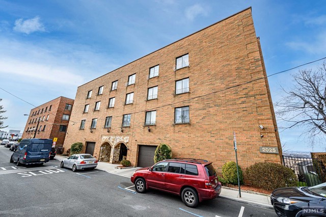Grandview Condos premieres this lovely 2 Bed 1.5 Bath second floor unit, just minutes from NYC, with Master Suite & private Balcony, sure to impress! Well maintained with plenty of natural light all through. Spacious Living rm with large glass slider offers lovely skyline views & Balcony access. Seperate Formal Dining rm & sizable Eat-in-Kitchen with ample cabinet storage. Guest 1/2 Bath is extra convenient! Large Master Suite offers it's own ensuite bath with tub shower. Covered Parking & Lobby area with Elevator access adds to the package. All of this & more in a prime location, just one block from Kennedy Blvd. & close to NYC public transit for a seamless commute. Why rent when you can own!? Come & see TODAY!