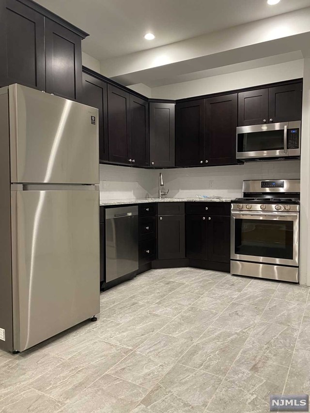 Wow!!! Fully renovated one bedroom apt in the heart of Rutherford. This unit has it all- from an updated kitchen and bathroom, hardwood floors, new appliances including dishwasher, washer/dryer, central air, one parking spot included, and is within walking distance to the train station!!! This is the one you have been waiting for, call today!