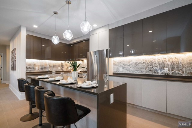 Appealing New Incentives Available on a 12M+ lease! Inquire today! Stunning, brand new construction ultra-luxury rental building on River Road in North Bergen. Absolutely gorgeous finishes and features with tons of amenities. Amazing Pool & Pool Deck with fire pit and grills with unobstructed NYC views. On-site gym, doorman, and garage parking available. Units currently available: 1 bed / 1 bath layout; 2 bed / 2 bath layout; and duplex-style 2 bed / 3 bath layout. State of the art kitchens boast Bosch appliances, sleek European-style cabinetry, under-cabinet lighting, waterfall quartz countertops, and center islands. Bathrooms offer imported porcelain tiles, Grohe trim package, and floating vanities. 7-inch hardwood flooring throughout. Laundry in unit. Storage available. Amazing location so close to transportation into NYC... Ferry & Bus! Close proximity to fabulous restaurants, shopping, Hoboken, and more. Pet may be considered. Credit Check & Proof of income required.
