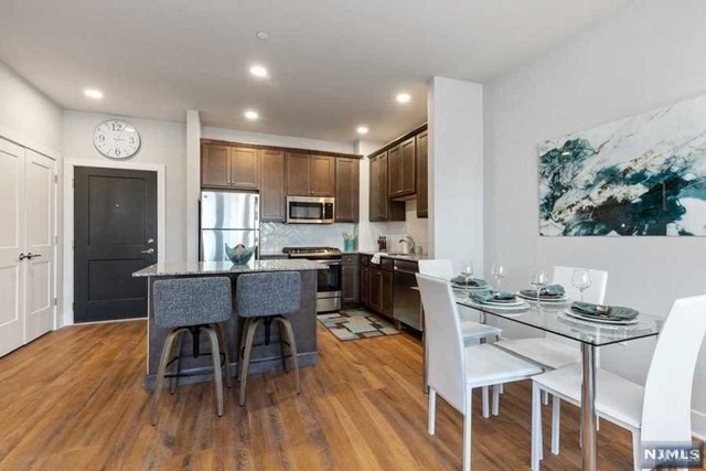 Beautiful new construction, luxury apartments located in Saddle Brook NJ are the perfect place to unwind and recharge. This unit is a 1,070 sq ft, 1 bedroom 1 bathroom w/large den for with all appliances provided, including a full-size washer and dryer! The open concept floorplan, high-end kitchen with granite countertops, designer bathrooms and beautiful flooring throughout offer apartment living at its finest. Other amenities include a virtual doorman, fitness center, common area WiFi, outdoor entertainment area, and more! Contact the leasing office for more information today!