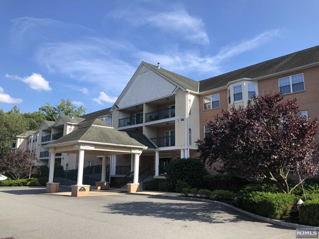 Welcome to Foxhill Manor. This is an active 55+ community situated on 6.5 acres of wooded land. Amenities include community room, exercise room, outdoor patio and courtyard. This unit features a primary bedroom with walk-in closet and full primary bath, kitchen, living room/dining room with balcony, washer/dryer in unit, and lots of storage. Full-time superintendent. Indoor parking garage with 1 assigned space. Lock-up storage available. Visitor parking outside. (Purchaser must contribute additional 5% of the purchase price to association reserve fund which is refundable upon selling of unit.)