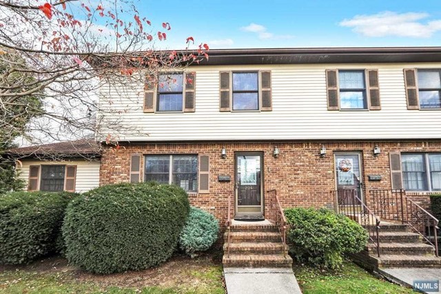 Why Pay Rent? Chance to own an end unit. Main level offers Renovated Kitchen with SS Appls and Granite Counters has French doors to back, Full Living Room opened to dining area, and half bath. 2nd level offers Large MstrBdrm w oversized closets, 2nd Bdrm, and main Full Bath. Bonus finished basement for additional living space. Attached garage with auto opener and Elfa garage rack system. Newer Wood Floors installed on main level. Side Yard convenient for grilling and outdoor enjoyment.