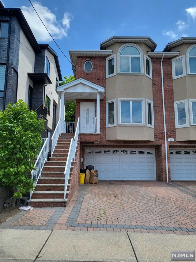 Well maintained duplex on one of the best dead end st. closed to walking nyc bus stop and broad ave. large living rm with gas fire place , dining rm and spacious kitchen with cherry cabinet , ss appliance and granite counter top. sliding door to private back yard.2nd fl has mbr with mbth/shower and jacuzzi tub.2 more rm and 1 fbth. laundry w skylighted hallway. gleaming hard wood fl thru out. basement is tiled with separate entrance and full bath. owner has nj real estate license.