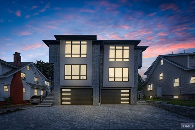 BEAUTIFUL NEW CONSTRUCTION BUILT BY ONE OF THE AREAS MOST REPUTABLE BUILDERS. THIS OVER SIZED 3,200 sq ft w/DARK STAINED HARDWOOD FLOORS, HIGH CEILINGS AND OPEN FLOOR PLAN. THE LIVING ROOM HAS A BEAUTIFUL FIRE PLACE, LARGE KITCHEN WITH LARGE ISLAND, WHITE CABINETS AND GREY BACKSLASH, THE 2ND FLOOR INCLUDES PRIMARY BEDROOM WITH LOTS OF CLOSETS AND PRIMARY BATH, 2 BEDROOMS 1 BATH. BASEMENT INCLUDES A SPARE BEDROOM, FULL BATHROOM AND COMMON AREA PERFECT FOR A FAMILY ROOM. INCLUDES A TWO CAR GARAGE AND SPACIOUS DRIVEWAY LOCATED NEAR SHOPS, PARK AND NYC TRANSIT