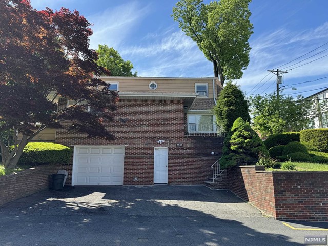 Updated 2 BR unit on the 2nd FL, One off street parking space. all hardwood floor, new kitchen with s/s appliances, newer bathroom. 1 block from main st Fort Lee. Very quiet and convenient location. Fenced back yard. W/D in the basement.