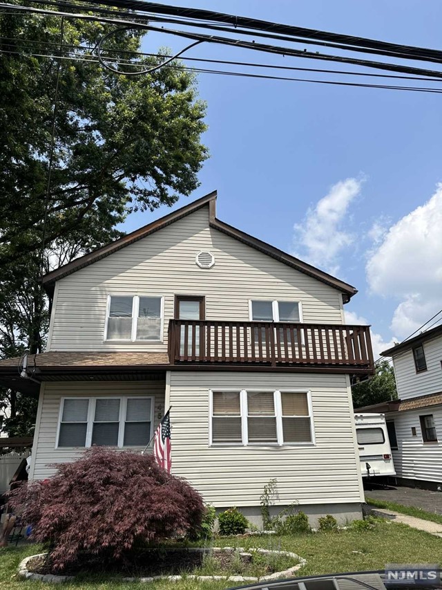 Welcome to this light filled, renovated second floor unit walking distance to bus stop direct to NYC. Newer kitchen, lighting, flooring, and washer and dryer make this unit a sight to see. Two private balconies, one off the main living area and one off the primary bedroom, help to connect you with outside. Tenant will enjoy shared use of the backyard and (1) off street parking space in driveway. Newer W/D in unit. Gas/Electric/Heat paid by tenant. 1st month rent, 1.5 month security deposit, and 1 month broker fee due at lease signing. Landlord looking for 1 month pay stubs, RentSpree application, and references.