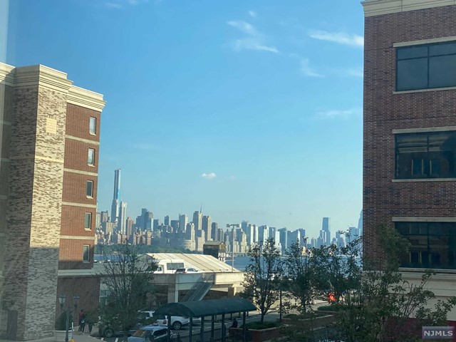 UPGRADED SOUTH FACING UNIT WITH NYC VIEW IN CITY PLACE. VERY LARGE SPACIOUS OPEN LAYOUT (1465 SQ FT) 2 BEDROOMS 2 FULL BATHS WITH A DEN. HOME IS FULLY RENOVATED. THIS ONE WONT LAST !