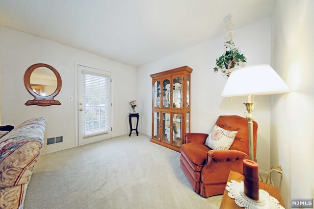 Bright, immaculate, well kept first floor unit. Just move right in! Remodeled bathroom with granite counter top. Newer windows and furnace. Wood burning fire place. Central air conditioning. Laundry in unit. Separate storage area conveniently located across from the unit. Large bedroom with a large walk in closet. Plenty of parking. Includes a pool, tennis courts, jogging path, and basketball courts. Close to shopping, highways and public transportation.