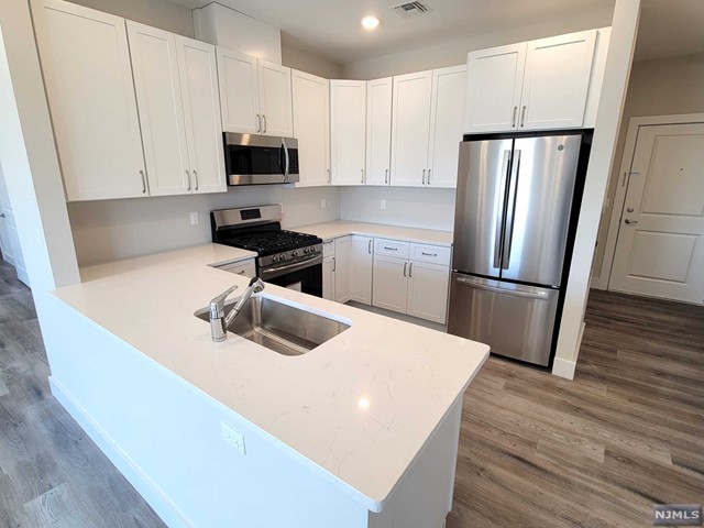 ONE MONTH FREE RENT!!! NO BROKER FEE!!! BRAND NEW CONSTRUCTION Apartment is ready to be Your New Home! Spacious, Modern Layout with almost 1000 square feet, featuring an Open Concept with Large Windows for Tons of Natural Light to shine in! Beautifully Designed Kitchen features Quartz Counters with Brand New Stainless Steel Appliances. Central Air, Recessed Lighting and Washer/Dryer in unit for your convenience. Spacious Bedroom with Large Walk-in Closet. One Parking Space INCLUDED! Conveniently located close to everything, walking distance to Anderson St. Train Station, Bus Stop, Restaurants, Markets, Shops, etc. Sorry, no smoking and no pets allowed. Owner has NJ Real Estate License.