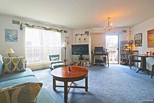 Two bedroom condo for sale in the sought after Westgate Community in Fort Lee! This lovely unit features bright windows with a sliding door leading to a walkout patio. Open concept floor plan boasts a large kitchen with countertop seating, living room and dining area, two large bedrooms, and bath. Master bedroom features a large walk-in closet. Plenty of closet space throughout! Washer/dryer in unit. Westgate includes 24hr gated security, private health club, sauna, pristine indoor pool w/ hot tub, gym, and community room for entertaining! This great location is near Fort Lee parks, recreation, NYC transportation, and shopping!