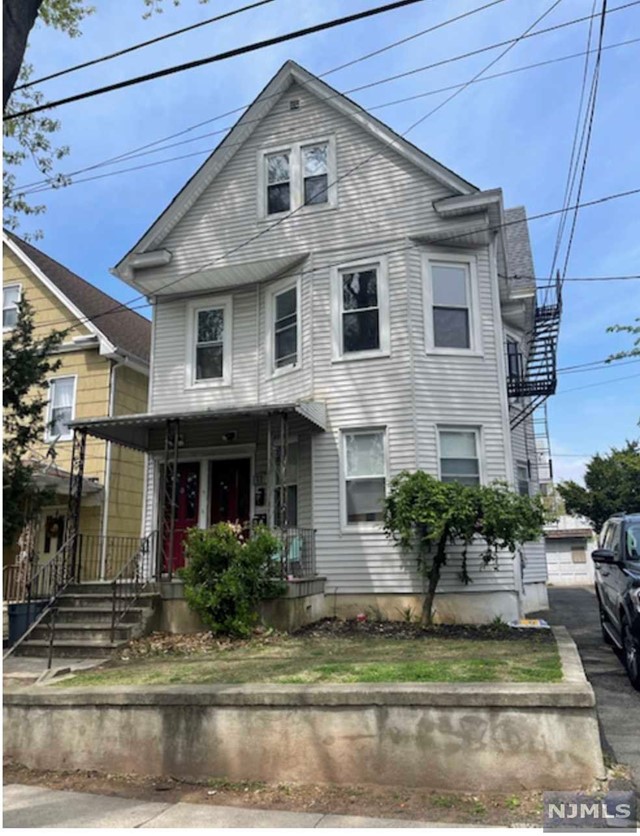 First floor three bedroom updated apartment. Large living room, EIK, washer/ dryer hook ups in kitchen. Updated bathroom, use of backyard. Hardwood floors throughout. Private entrance