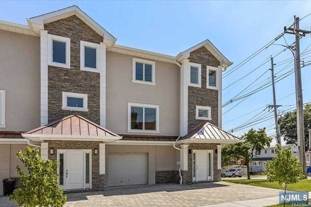 Brand New Duplex! Custom built - 3 bedrooms, 3 bathrooms, with marble and hardwood flooring throughout. First floor boasts entry foyer, laundry room, entry to garage, office/play room and full bathroom. Second floor has a an open floor plan with kitchen/dining/living room set up and a full marble bathroom. Third floor houses all the bedrooms for added privacy and separation, including a full marble bath with a tub. All appliances are brand new, gas cooktop, wall over, smart thermostat, quartz countertops and much more! Use of yard and separate utilities.