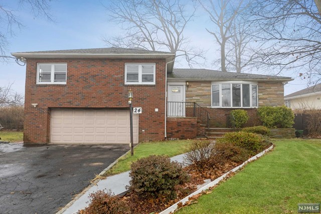 Great neighborhood in the Cliffs! NYC transit at the corner. Large lot with patio and terrace. Home has been recently painted, floors redone, newer kitchen and bathrooms. New window treatments. Extended family living downstairs. Come take a look at all this home has to offer.