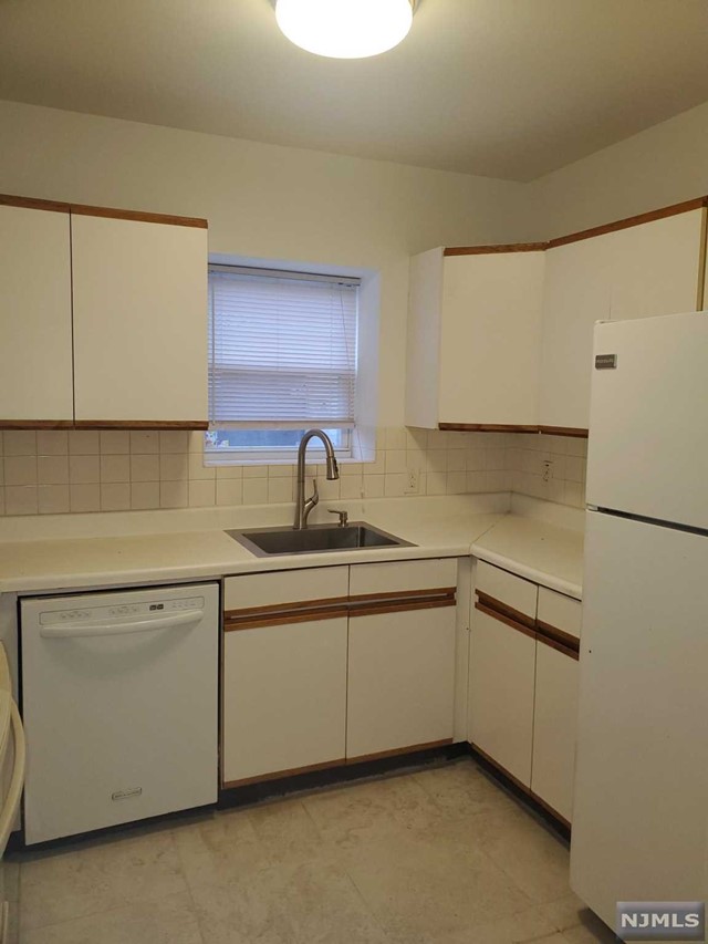 CALL/TEXT 973 666 3639 FOR MORE INFORMATION. SPACIOUS GROUND FLOOR(NO STEPS) 2 BEDROOM CONDO W/ GARAGE AND LAUNDRY