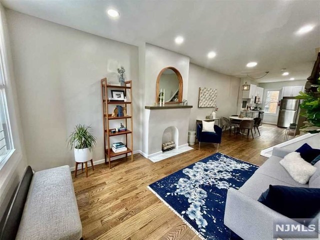*1ST MONTH FREE*! Single family spacious, charming townhome for RENT!! Located in the fast growing Bergen Lafayette area. Fully renovated with 3 bedrooms, 2 full baths, Kitchen, Living Rm, Dining Rm and Office/ Den. Large, modern kitchen with great countertop and cabinet space. Separate dining area leading to a spacious living room. Fully tiled baths, high ceilings and natural light throughout. Large private, fenced in yard included. Growing community with renovation and development projects all around. Walk to the LightRail and take a quick ride to Liberty State Park and Downtown Bergen Lafayette restaurants and bars. * Some photos are of a similar unit*