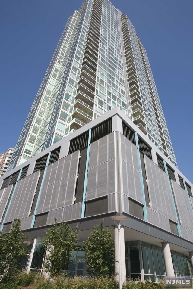 Best 1 Bedroom on the Gold Coast! Stunning Direct East NYC/River Views from this 1050 Sq FT. 1Bedroom/1.5Bath in the Luxury Waterfront Crystal Point Condominium. This unit features Open Floor Plan, Gleaming Hardwood Floors Throughout, Hunter Douglas Blinds, New Bosch Washer/Dryer In Unit, Central Air, Open Kitchen, Spacious Bedroom with Walk-In Closet and 1 Valet Parking Included in the rent. The amenity rich building offers 24/7 Concierge, Gym, Swimming Pool, Sauna Steam, Jacuzzi, Children's Play Room, and Theater. Close to Newport / Exchange Place PATH, Ferry, and Light Trail. Water, Hot Water, Gas, Sewage, Trash, 1 Valet Parking Spot and Amenities included in rent.