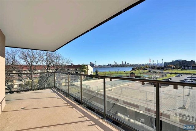 PROUDLY PRESENTING THIS BEAUTIFULLY DESIGNED 2 BED/2 FULL BATH APARTMENT HOME WITH BREATHTAKING HUDSON RIVER & NYC SKYLINE VIEWS SITUATED IN A 24HR DOORMAN HI-RISE KNOWN AS HUDSON HARBOUR CONDOS-CONVENIENTLY LOCATED IN THE HEART OF EDGEWATER, NJ WITH NYC BUS AT GATED ENTRANCE,PARK NEXT DOOR AND JUST MINUTES FROM NYC, PARKS, SCHOOLS, FERRY, SHOPPING CENTERS, FINE DINING & SO MUCH MORE. FEATURES INCLUDE AN INVITING, SUN-FILLED LIVING/DINING SPACE WITH UPDATED KITCHEN AND BATHS, SPACIOUS BEDROOMS WITH FLOOR TO CEILING CLOSETS, HUGE PICTURESQUE WINDOWS, PREMIUM VINYL FLOORING, ENORMOUS WRAP AROUND TERRACE WITH NYC VIEWS, CLOSETS GALORE & SO MUCH MORE. MONTHLY MAINTENANCE INCLUDES ALL UTILITIES, 24HR GUARD HOUSE/DOORMAN, OUTDOOR POOL, TENNIS COURT, PLAY AREA, LIBRARY/LOUNGE AREA, FITNESS ROOM AND CABLE/INTERNET PACKAGE, ONE OUTDOOR ASSIGNED PARK SPACE IS INCLUDED AS AN ASSIGNMENT. THIS IS ONE OF THE BEST ALTERNATIVES TO NYC LIVING AND TRULY A MUST SEE!!