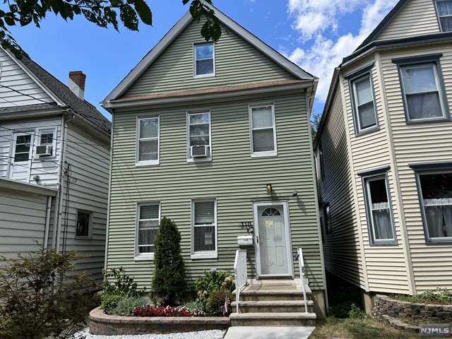 Fully renovated colonial on a quiet street in Ridgefield Park minutes from Route 80 and the GW Bridge. First floor features an entry foyer, living room and dining room with wide plank floors, wainscoting and decorative moldings. New eat-in kitchen with white shaker cabinets, farm sink, quartz countertops, SS appliances and herringbone tile floor. Back porch overlooks a lushly landscaped, fenced yard with paver walkway and patio. On the second floor of the home is a primary suite with newly renovated bathroom, second bedroom and a second full bathroom. Continue upstairs to an oversized unfinished attic perfect for storage. The finished basement features rec area, laundry with sink and two dryers, and additional storage. Easy street parking, access to highways and NYC transit. Available Immediately. Landlord will consider a small pet. Interview, credit check and renters insurance required. Tenant responsible for lawn maintenance, snow removal and first $150 of repairs