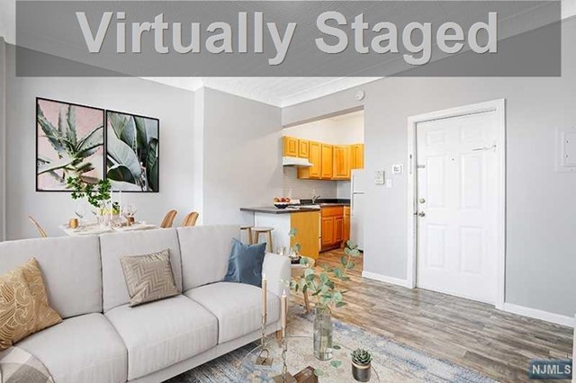 Located in the best section of Union City known as West Hoboken, this recently renovated apartment featuring 1 Bed and 1 Full Bath will sure to please with approx. 800 sqft with driveway parking and a shared washer and dryer in the basement. Step into the open layout kitchen, living room, and dining room with all new wood flooring throughout, open kitchen, and original tin ceilings to give it that old world charm. Large bedroom room features 4 large windows wand a full updated bathroom with a walk-in shower. Included in the home, is one car parking, W/D room in the basement and heat and hot water included. Located right next to Washington Park, enjoy the dog park, tennis courts, soccer field, grocery store, and steps away from major NYC transportation. Walk to Hoboken light rail from Palisades Ave. You won't find anything else like this!