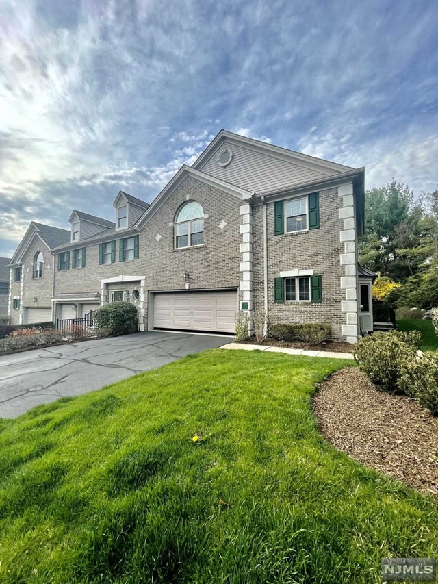 Beautifully decorated town home in Bear Brook Village. This end unit is much larger than it appears! The welcoming vestibule with cathedral ceiling leads you into a stunning living room with gas fireplace and family room with sliding glass doors to patio. There's a large formal dining room and updated kitchen with breakfast nook. The second floor boasts a Master bedroom suite and a second bedroom also with in-suite bathroom and Laundry room. You'll be pleasantly surprise at the very spacious finished lower level that offers additional room for everyone! With bonus/guest room, rec room, office and full bathroom. An additional bonus in the Village is full fitness center.