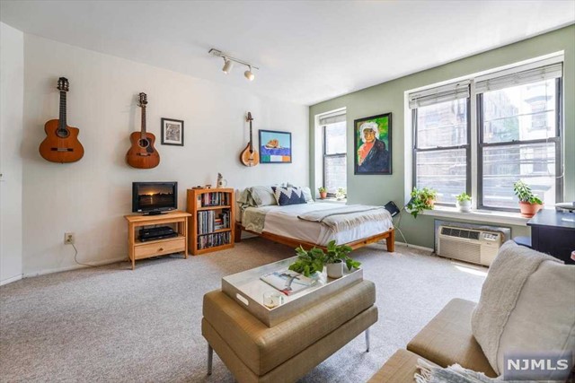 Whether you're seeking your own home or an investment opportunity, this sunny condo is perfectly situated in the heart of Hoboken. Just one flight up, the spacious studio offers ample room to relax, entertain, work from home, and cook. The separate kitchen has a refrigerator, microwave, electric stove, and dishwasher. The updated bathroom features modern tile and a tub. No need to worry about laundry, as the building includes a convenient washer/dryer. Located just blocks from the Hoboken Terminal, you can easily access the NY Waterway Ferry, PATH, Light Rail, Washington Street, and the beautiful Hudson River Waterfront. Hoboken's vibrant city life awaits you with its wide range of schools, shopping, dining, coffee shops, and farmers' markets. Plus, enjoy the close proximity to the scenic Hoboken Waterfront. Offering the perfect blend of convenience and comfort in a lively urban setting, you don't want to miss this opportunity.