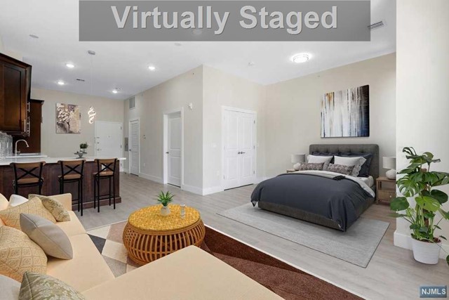 Welcome to The Maximilian this brand new luxury building in the heart of Belleville NJ ! Building includes designated yoga room, fitness room, common room & incredible roof top lounge with outdoor kitchen/grill, pergola and seating overlooking spectacular NYC views. 1 car parking for each unit included in rent. All units include brand new stainless steel appliances, quartz countertops and stackable washer/ dryer. Spacious peninsula island for 2-3 bar stools. Combined living / bedroom area with separate alcove for bedroom area. Spacious bathroom with tub. Conveniently located near bus stops, trains in surrounding towns. Ample amount of diverse restaurants & shopping. High efficiency water heaters. Separate HVAC units. Central a/c & forced hot air. Tenant pays gas, electric & water . Cats/small dogs ok. Beautiful lobby with elevator access to each floor. Mail room/package system. Cafe in building coming 2024!