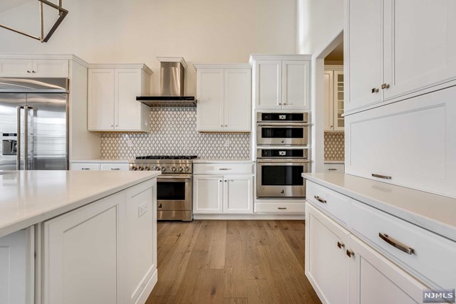 AVAIL 3/1 - Well-designed features for luxury living in The Reserve at Franklin Lakes. The most sought-after development in Bergen County with pool, club house, outdoor common area in a parklike setting. As you enter this welcoming two-story foyer, you will automatically see a bright and inviting home featuring a large kitchen opened to a spectacular family room with a gas fireplace. The private first floor primary bedroom suite includes dual walk-in closets and a private bath with dual-sink vanity and luxe shower. The second-floor features two bedrooms, plus den, huge open space area, one full bath. The lower level has a Recreation room and a half bath, for all your entertainment needs and more. A fully equipped smart house, security and cable hook-up ready to move right in. Outdoor has a large deck with plenty of room and built-in outdoor grill to invite all your guests. Schedule a viewing today!