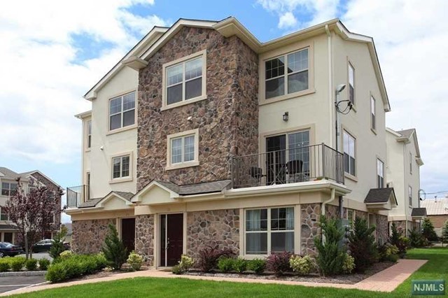 Text/call Michael at 201-240-8422 for a showing. This unit is priced to move FAST! This 3BR/2.5BTH corner unit in the town's only GREEN complex, Sussex Green, is a commuter's dream with a bus stop right outside the complex; and walking distance to schools and parks. The main floor features an open floor plan highlighted by a gourmet kitchen with stainless steel appliances, granite tops and tons of natural light flooding the unit. Sliders to outdoor terrace. Hardwood floors run throughout both floors. Huge living area, 1/2 bath and pantry complete the 1st floor. Venture upstairs to find your master suite with a walk in California closet, tray ceilings and a master bath with jacuzzi tub and shower. There are 2 additional bedrooms, a full bath off hallway and washer/dryer. The unit comes with 2 deeded parking spaces. Tankless water heater was just replaced. This condo is priced to move.